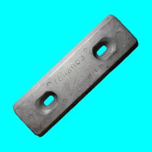 Metal block with holes on blue background