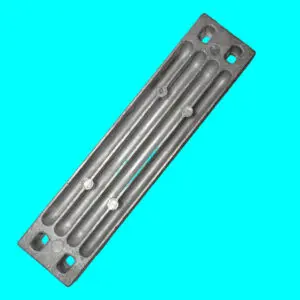 Industrial metal component against turquoise backdrop